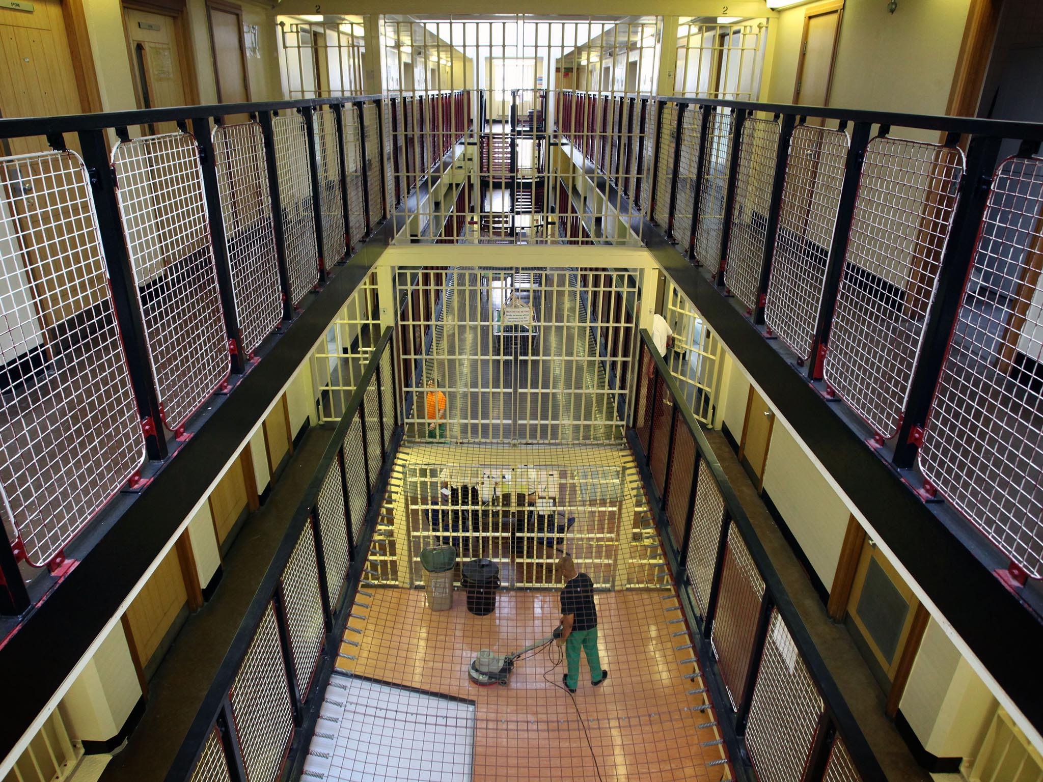 Inmates on cleaning duty at HMP Belmarsh