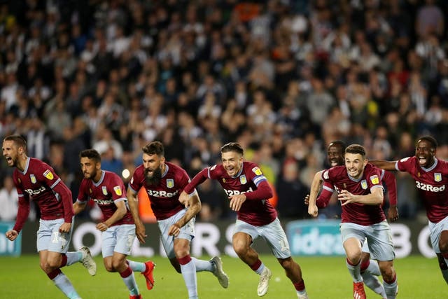 The Aston Villa players celebrate their shootout victory