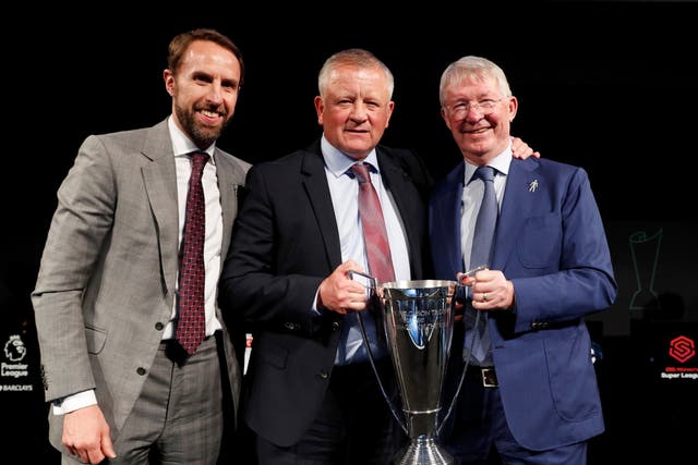 Chris Wilder poses with The Sir Alex Ferguson trophy for the LMA Manager of the Year 2018/19 with Sir Alex Ferguson and Gareth Southgate