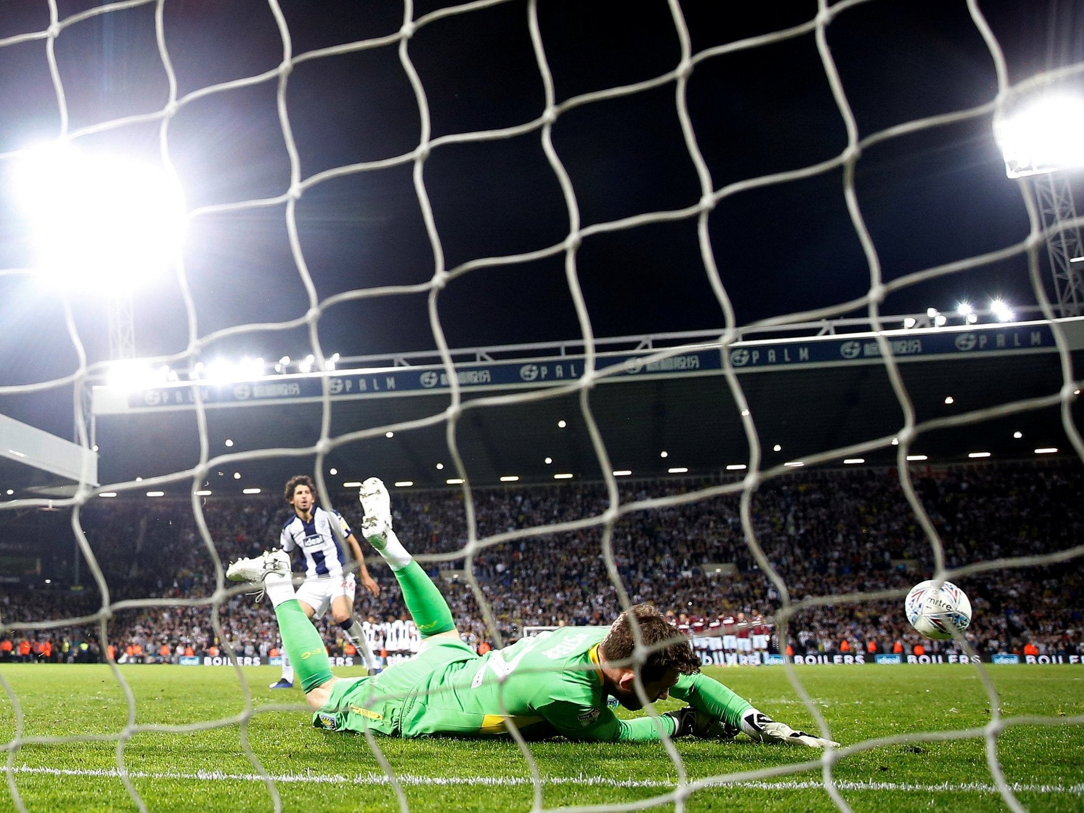 Aston Villa's Jed Steer saves a penalty from West Bromwich Albion's Ahmed Hegazi