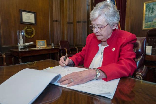 Kay Ivey said she was signing bill after it was passed by both houses