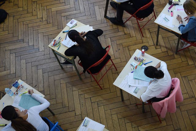 School students take an exam