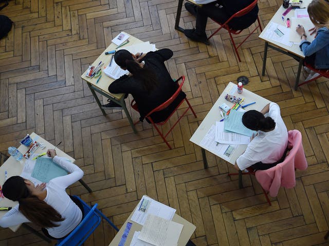 School students take an exam