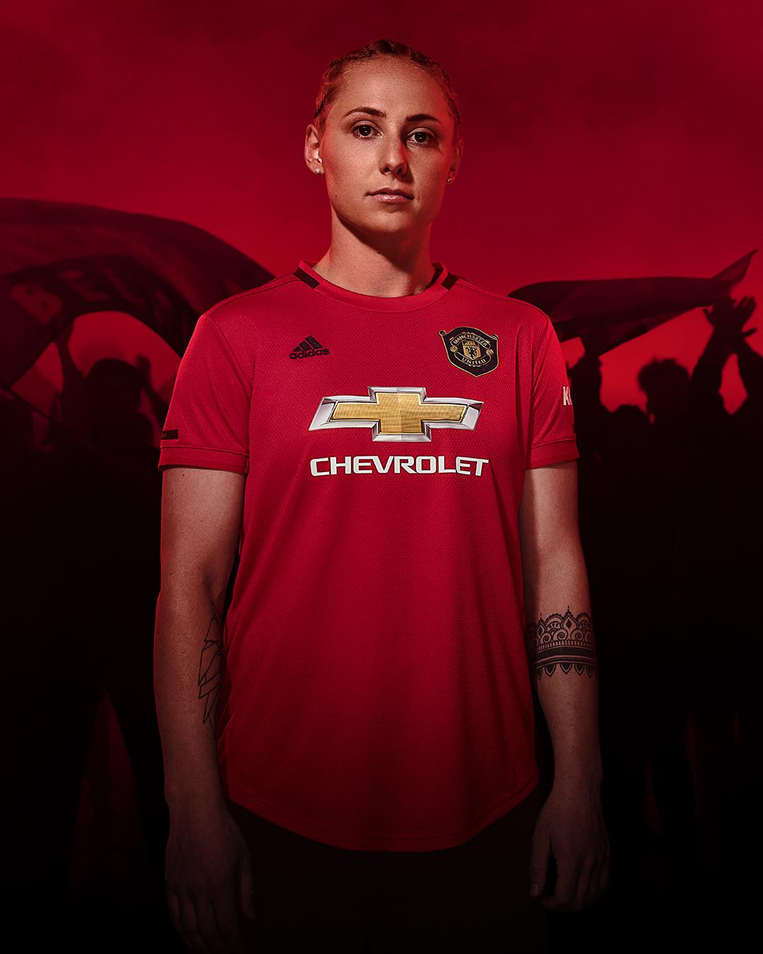 Alex Greenwood models the Manchester United Women's kit (Adidas)