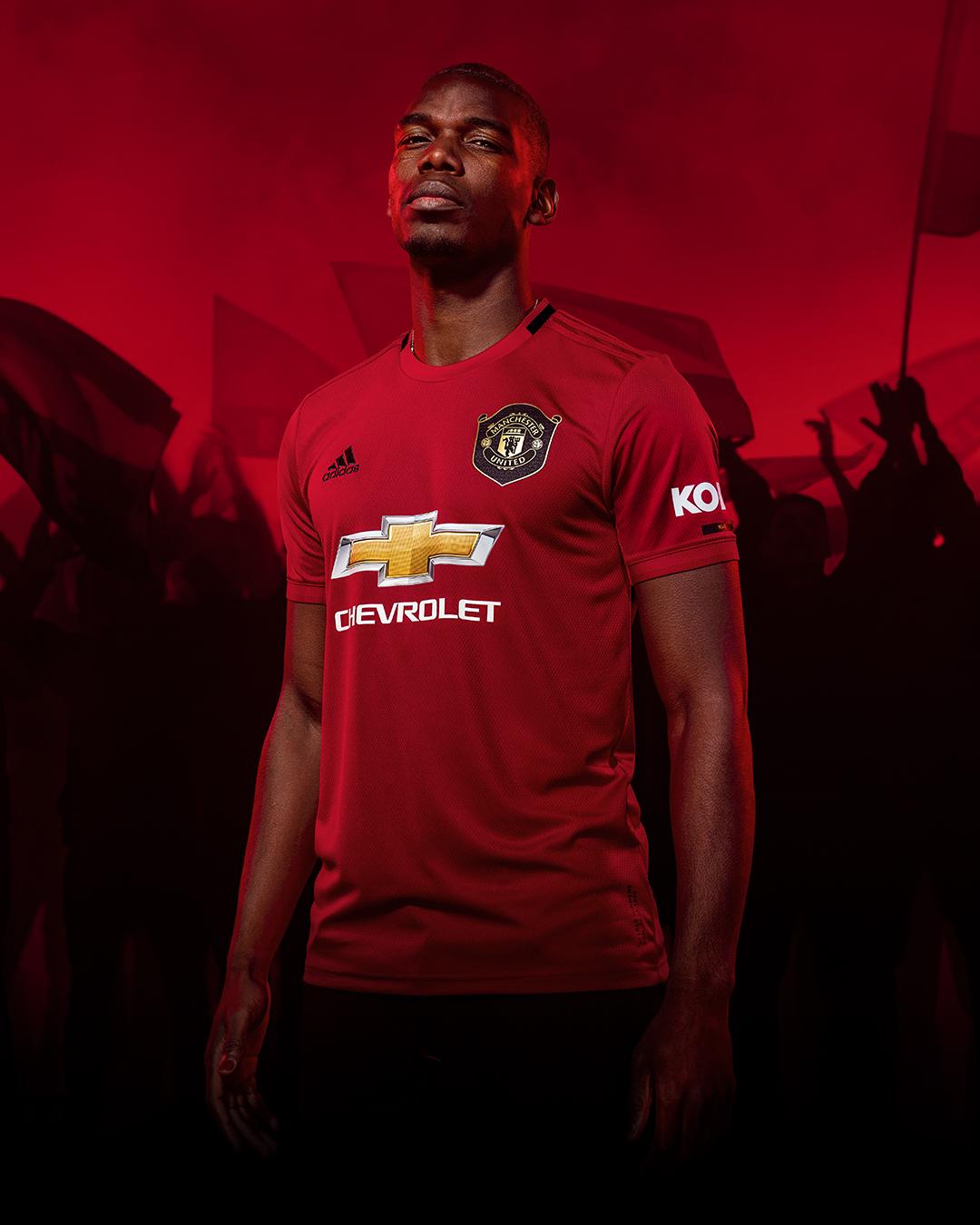 Paul Pogba models the new Manchester Untied home kit (Adidas)
