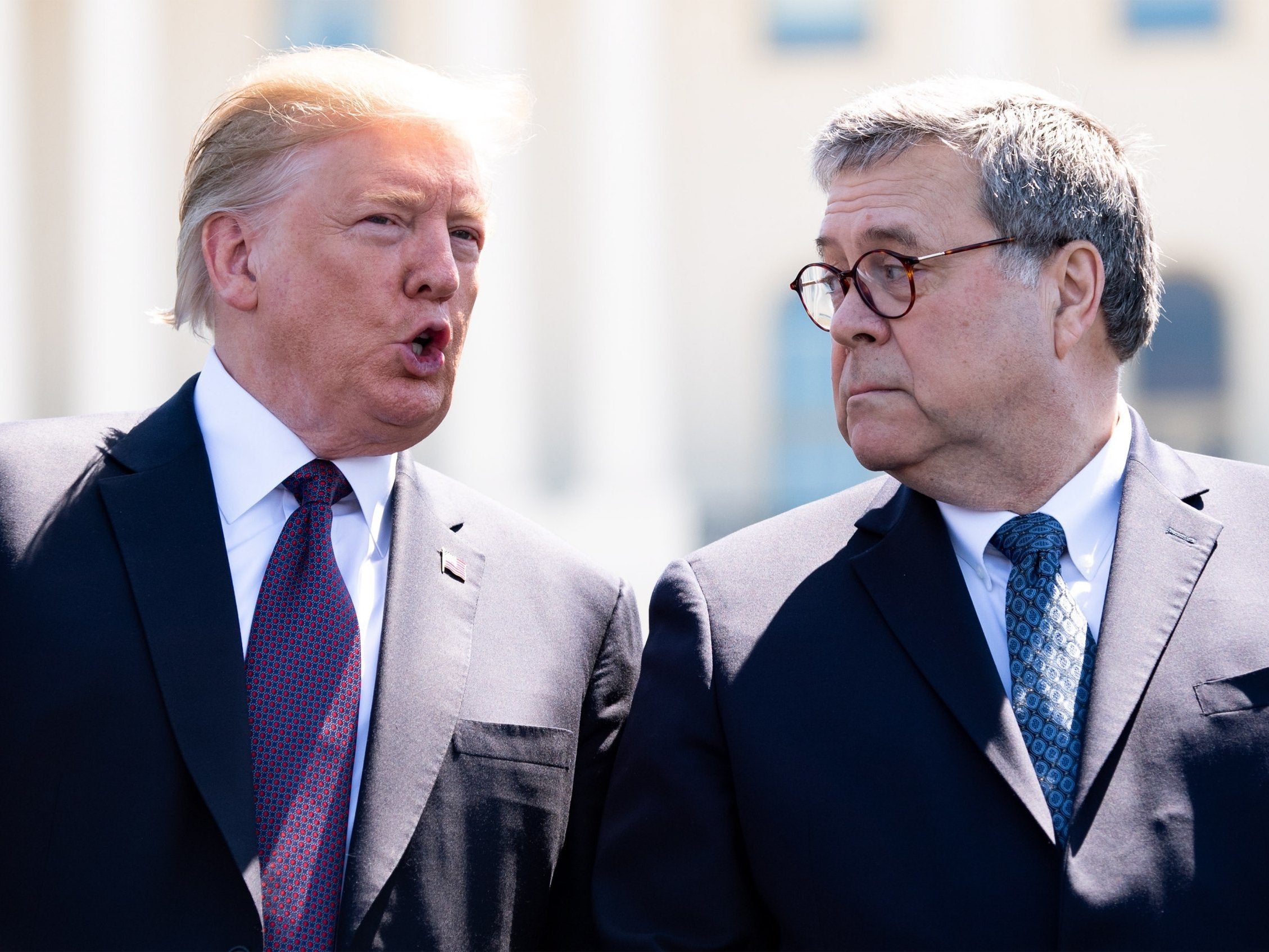 President Trump talks to attorney general William Barr during the 38th annual National Peace Officers' Memorial Service, at the US Capitol in Washington, DC, on 15 May 2019