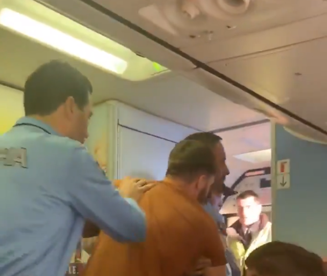 A passenger was escorted off the aircraft by Portuguese police