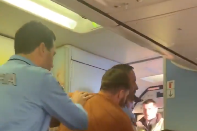 A passenger was escorted off the aircraft by Portuguese police