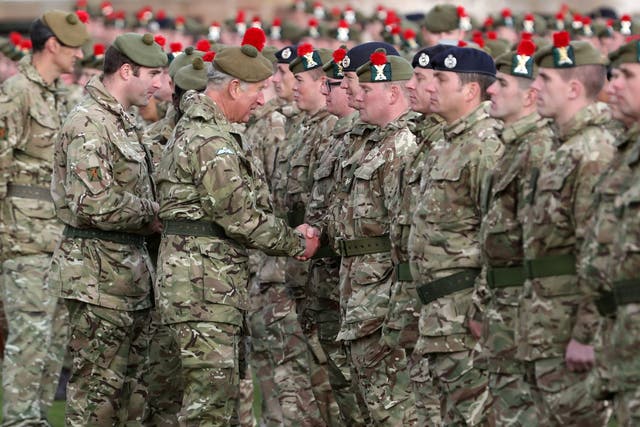 Prince Charles presents Iraq campaign medals to soldiers from The Black Watch, 3rd Battalion, The Royal Regiment of Scotland, in September 2018