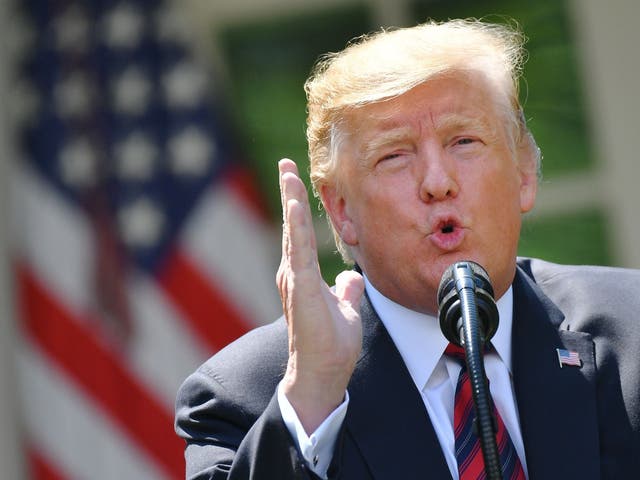 US president Donald Trump gestures as he delivers remarks on immigration at the Rose Garden of the White House in Washington, DC, on 16 May 2019