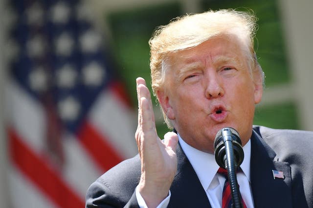 US president Donald Trump gestures as he delivers remarks on immigration at the Rose Garden of the White House in Washington, DC, on 16 May 2019