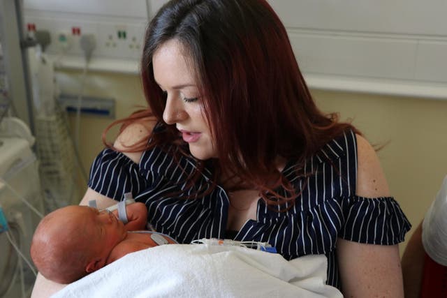 Sherrie Sharp, 28, and baby Jaxson underwent pioneering keyhole surgery while he was still in the womb