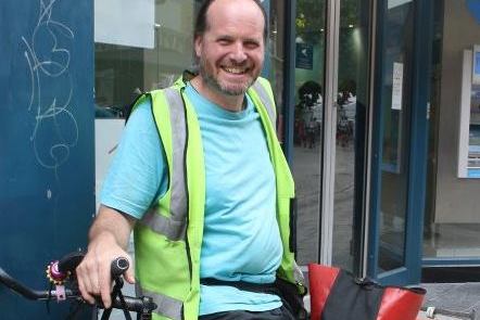 John loves chopping wood and looking after his bike