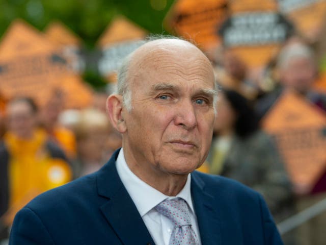 Liberal Democrats leader Sir Vince Cable with activists at the Civic Centre, Chelmsford following the voting in the English council elections
