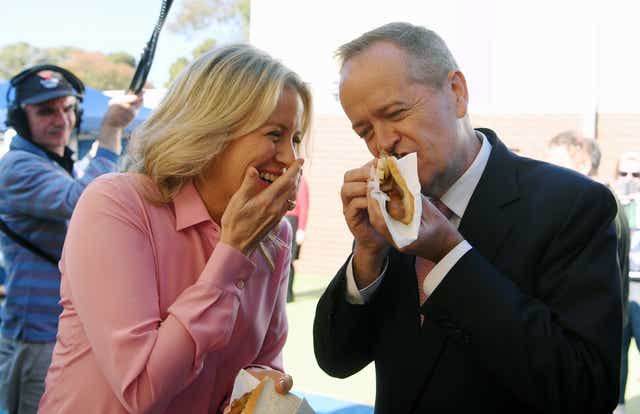 Australian Opposition Labor leader Bill Shorten and his wife Chloe eat democracy sausages.