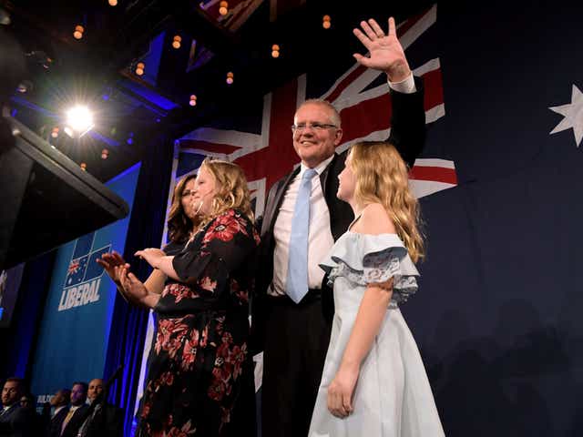 Prime minister Scott Morrison celebrates victory with his wife and daughters in Sydney