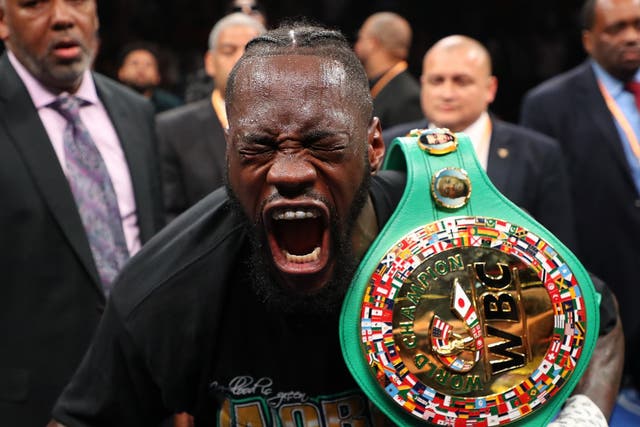 Deontay Wilder celebrates his victory over Dominic Breazeale