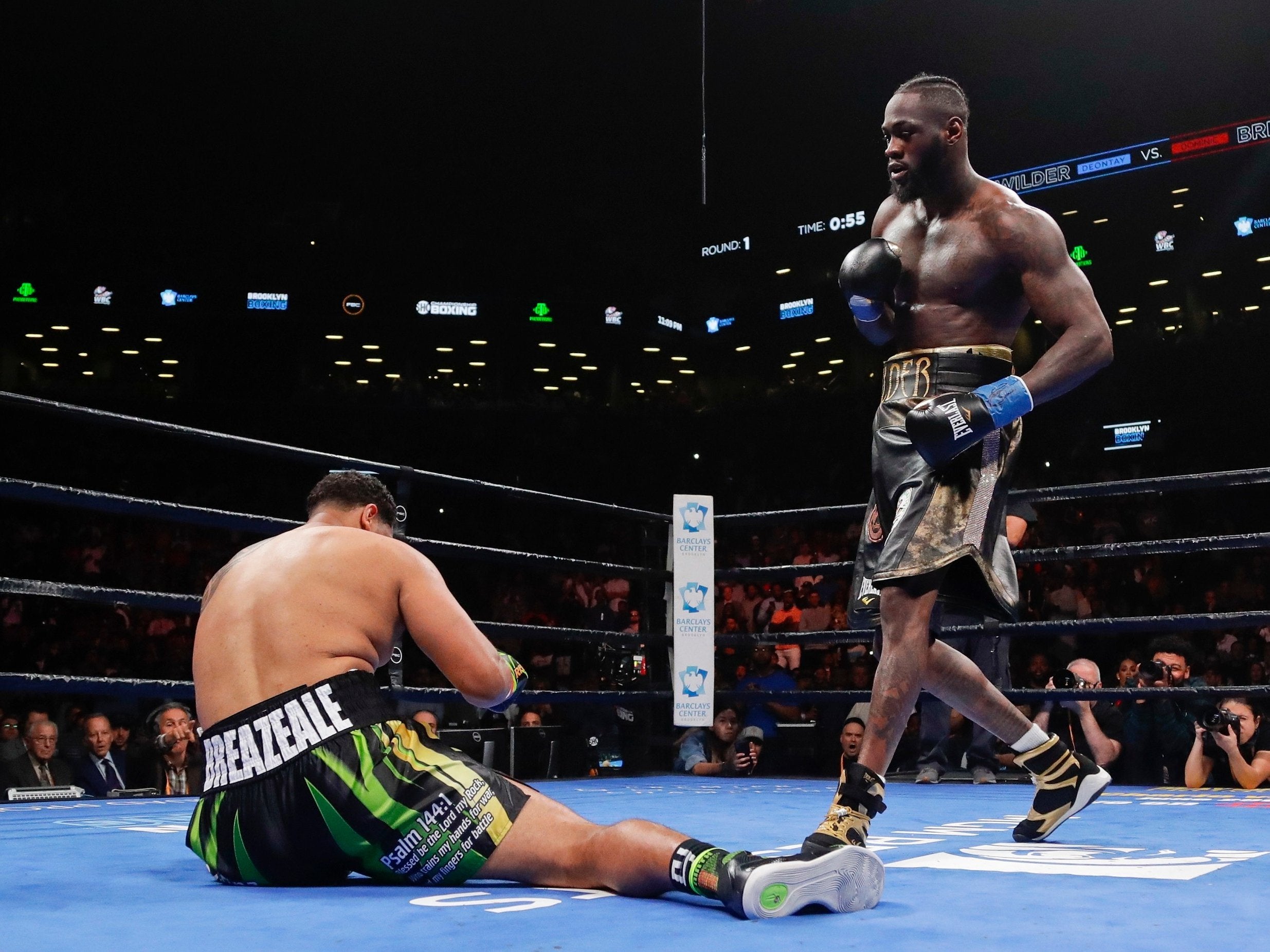 Deontay Wilder knocks out Dominic Breazeale in the first round of their heavyweight title contest