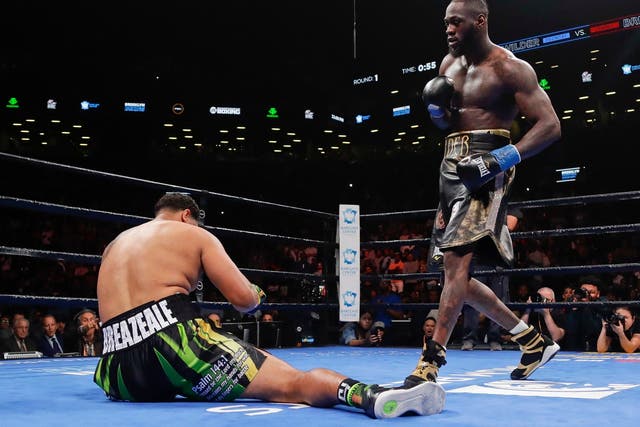 Deontay Wilder knocks out Dominic Breazeale in the first round of their heavyweight title contest