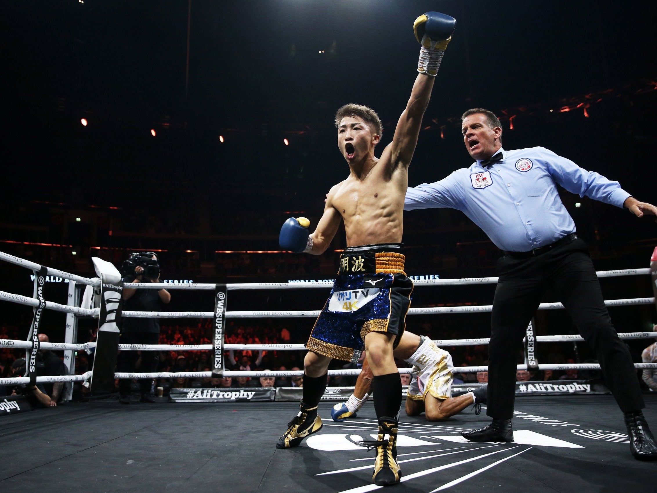 Naoya Inoue celebrates after beating Emmanuel Rodriguez