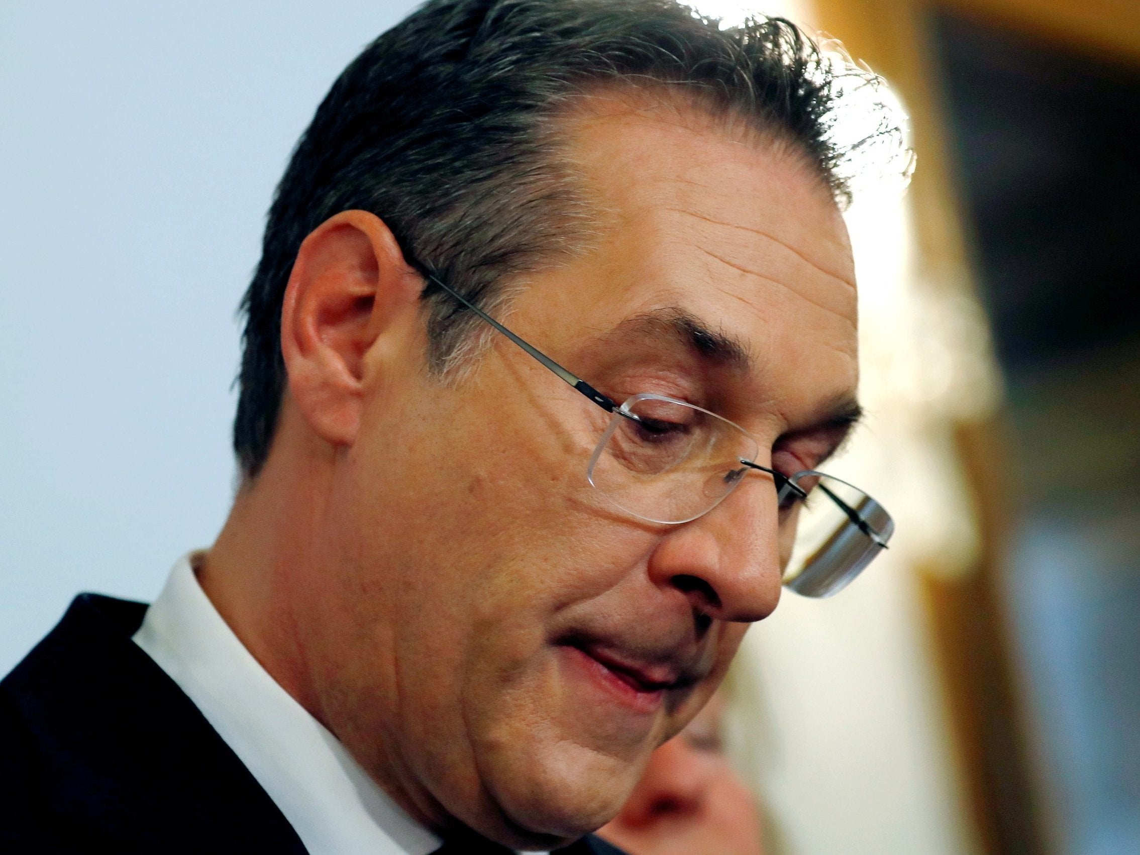 Austrian vice chancellor Heinz-Christian Strache reacts as he addresses the media in Vienna