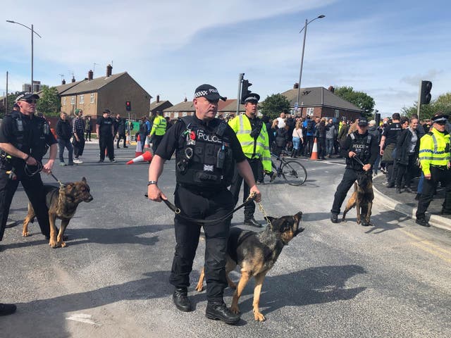 Police dogs deployed to disperse demonstrators after Tommy Robinson left the election rally