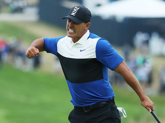 Koepka celebrates on the 18th green Getty)