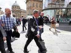 Nigel Farage hit by milkshake thrown by protester in Newcastle