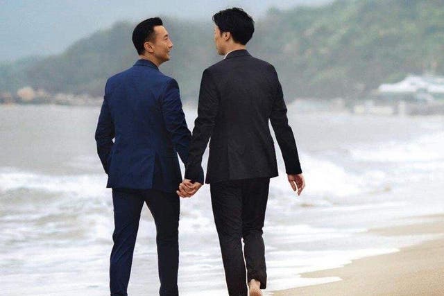 Travel ad showed same sex couple on beach