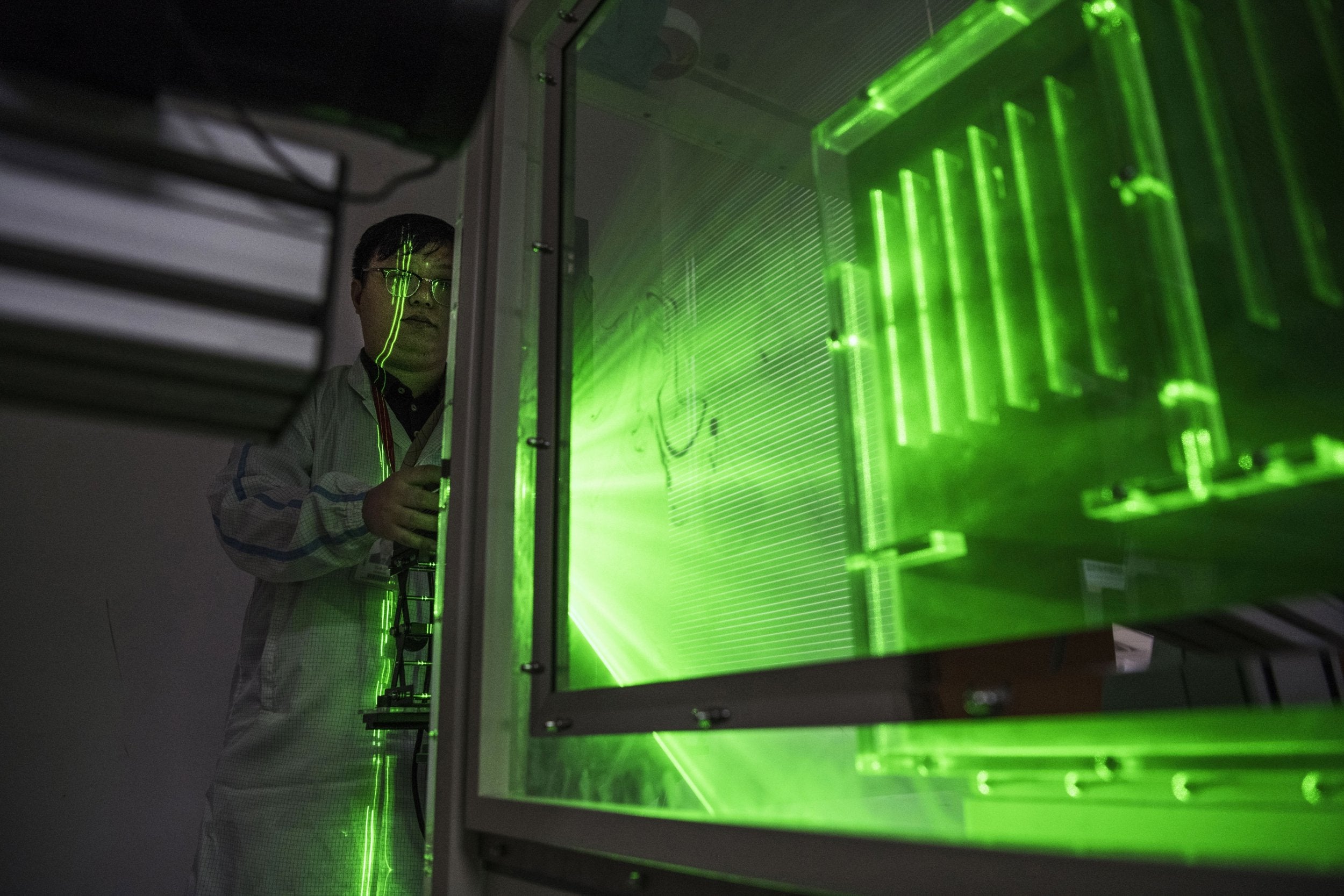 A Huawei thermal engineer performs a heat test in the research and development area of the Bantian campus