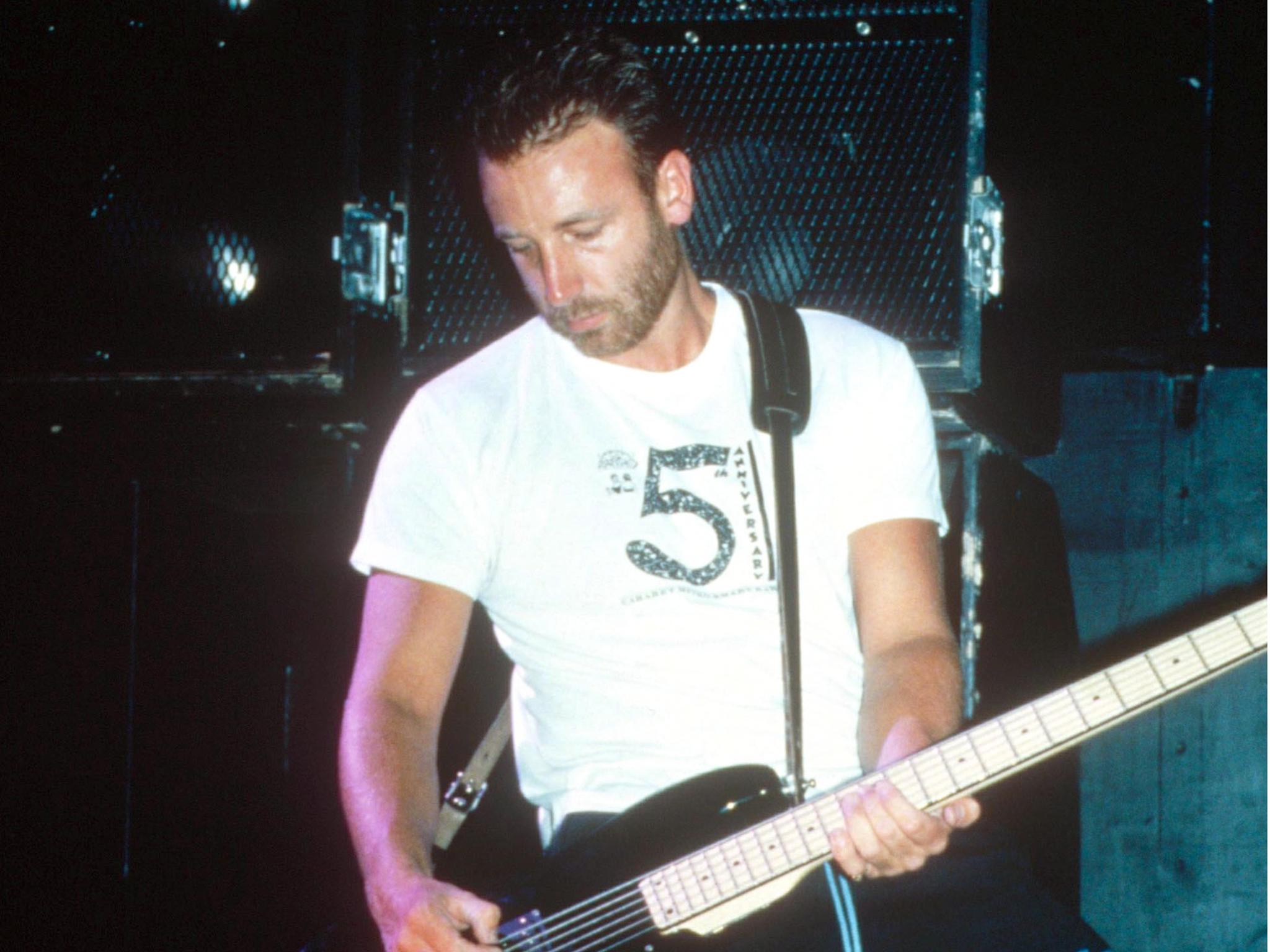 Hook on stage with New Order in 1987