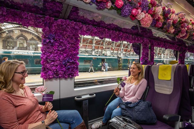 Passengers admire the Heathrow Flower Express