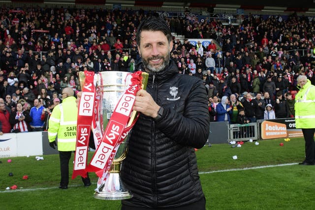 Danny Cowley celebrates with the League Two trophy
