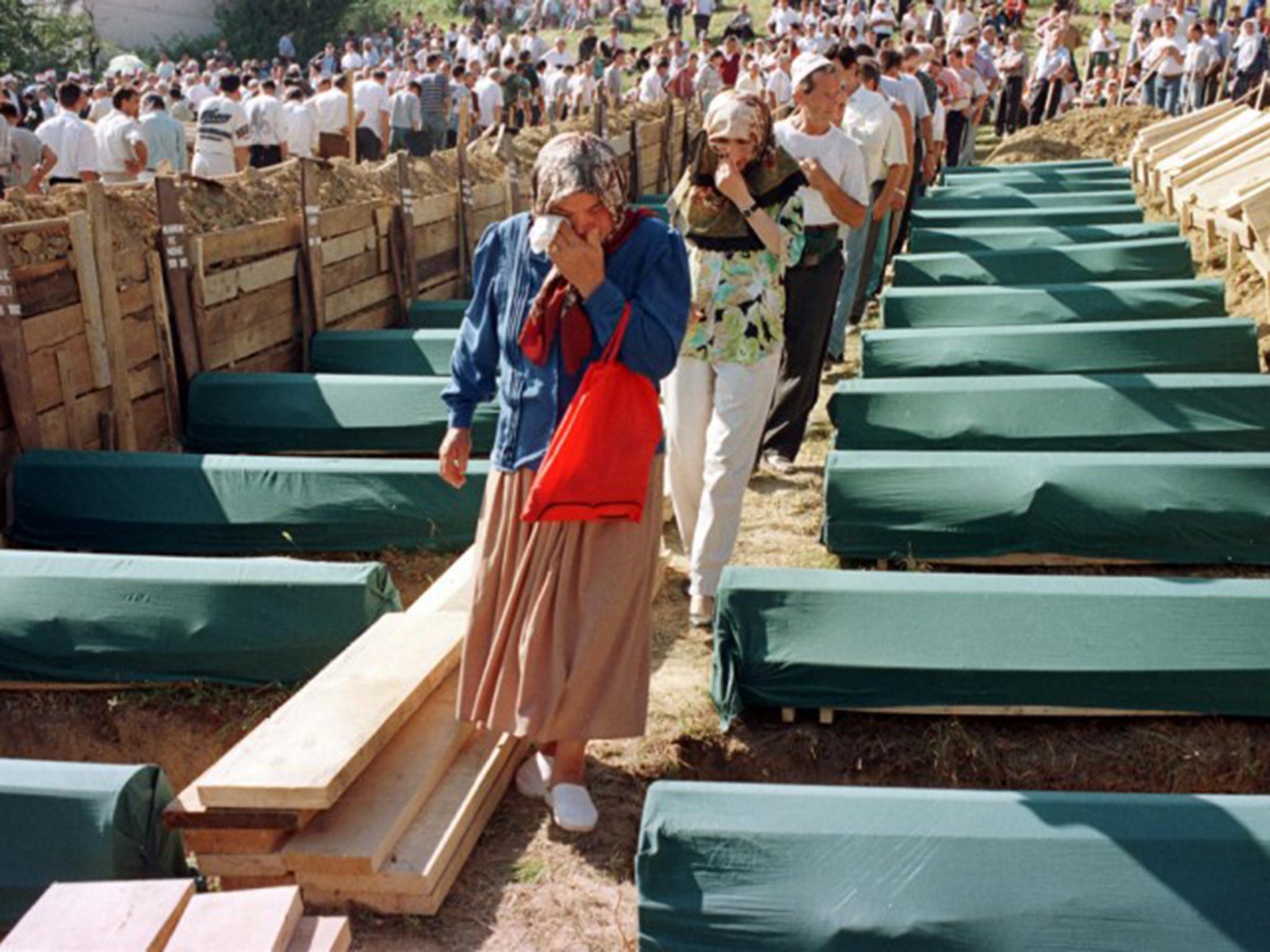 Mourners in Mostar visit the makeshift burial sites made by the people who lost their lives in the Bosnian war