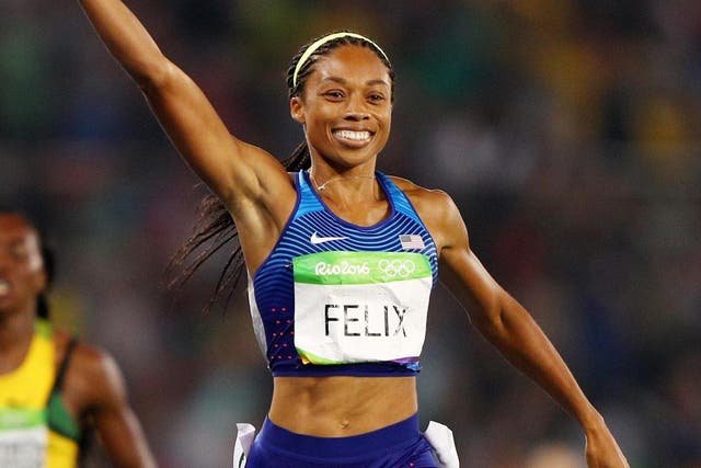 Allyson Felix reacts after winning gold for the US during the Women's 4 x 400 meter Relay at the 2016 Rio Olympic Games