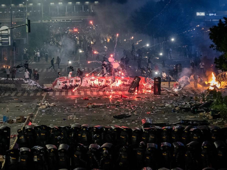 Protesters clash with Indonesian riot police during a demonstration on 22 May 2019 in Jakarta, Indonesia