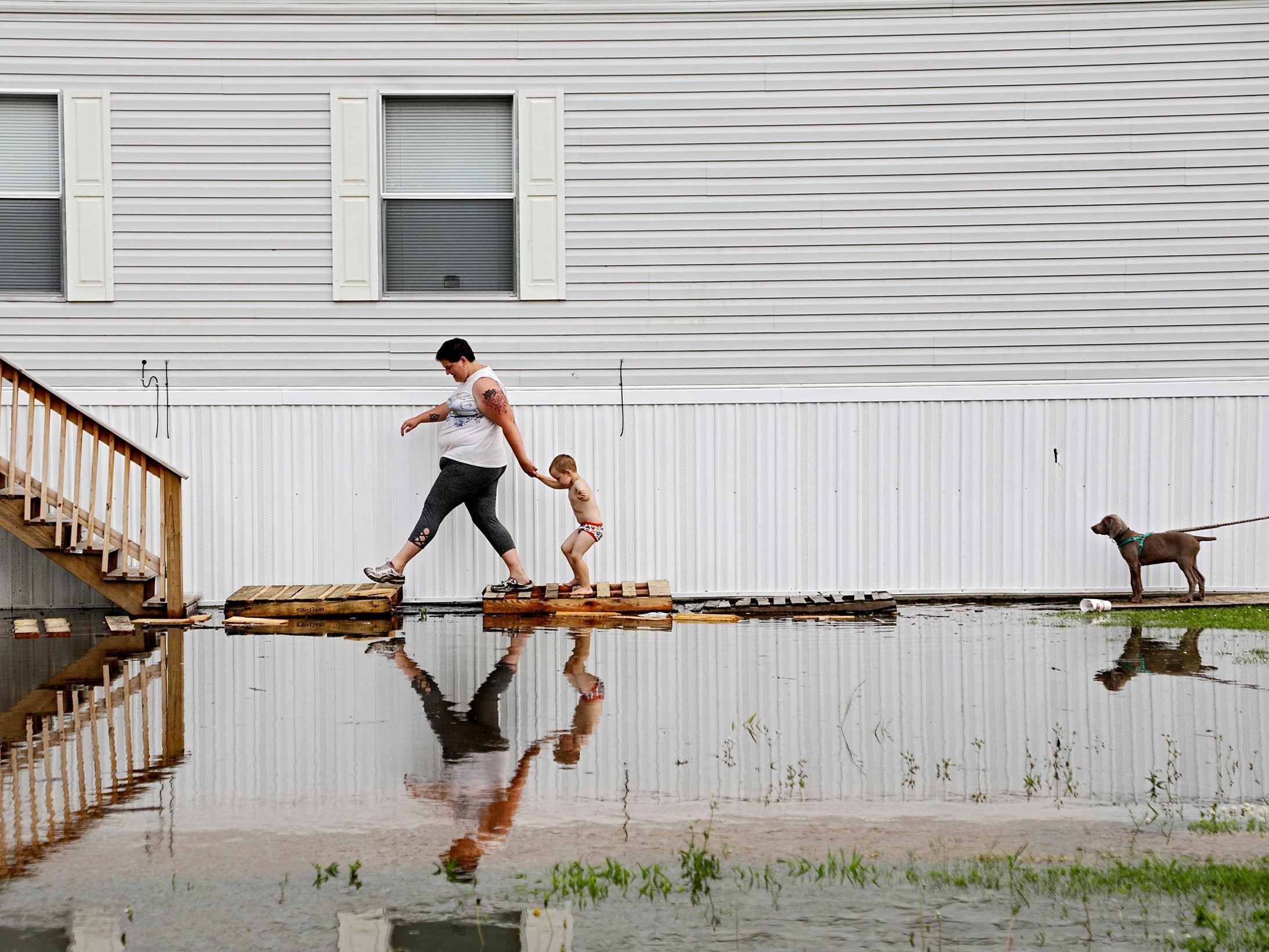 Floodwater from Arkansas River approaches a mobile home park in Muskogee, Oklahoma