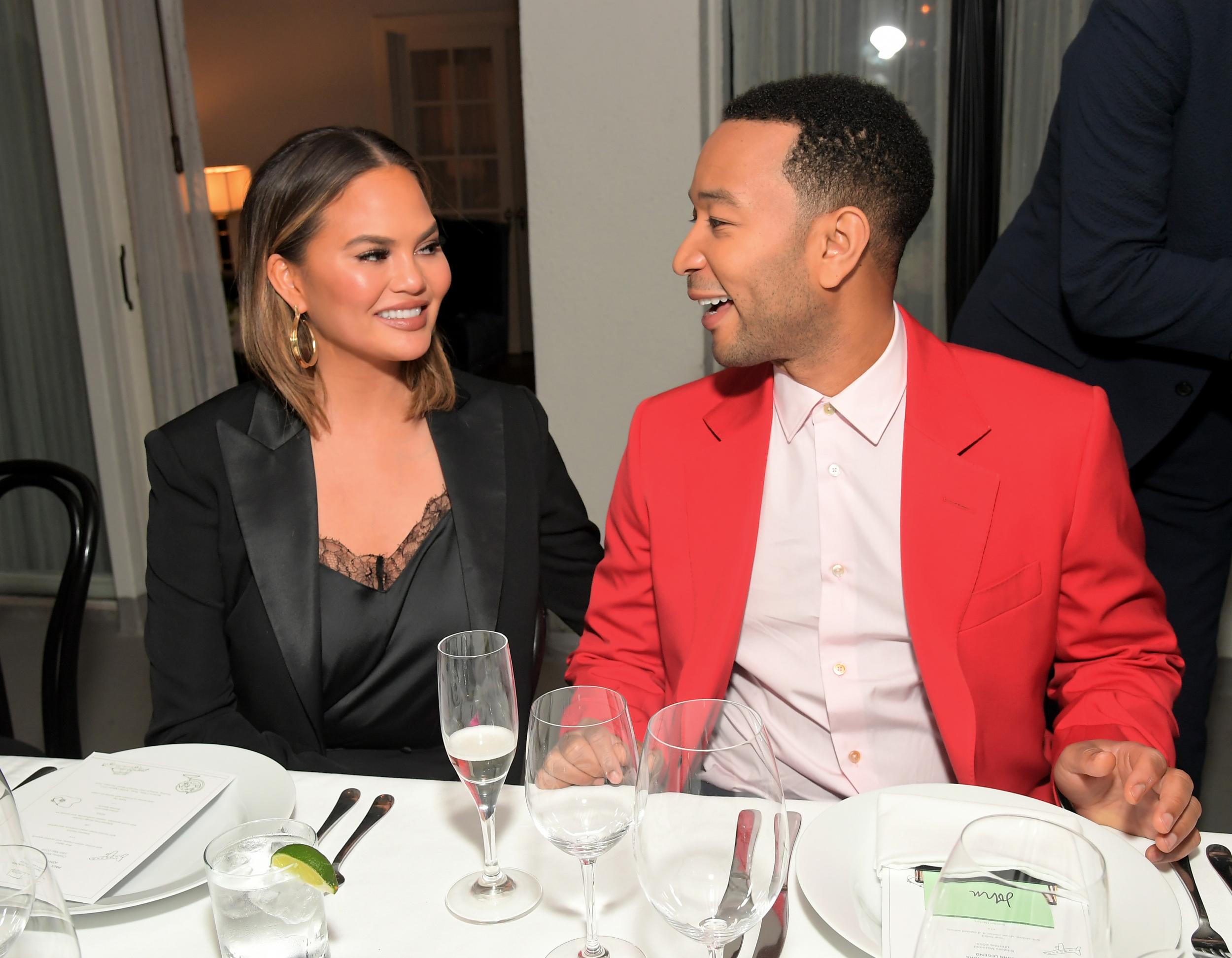 Chrissy Teigen and her husband, John Legend, who she described as "great and helpful"