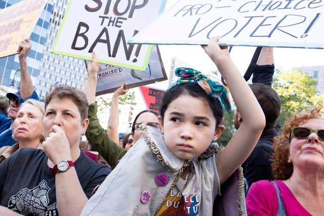 Avery Tsai, 9, of Brooklyn, New York participates in a pro-abortion rights rally in Foley Square in New York