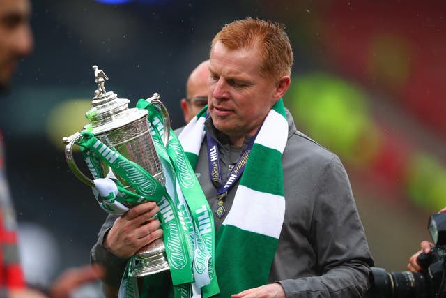 Neil Lennon celebrates with Celtic's latest trophy