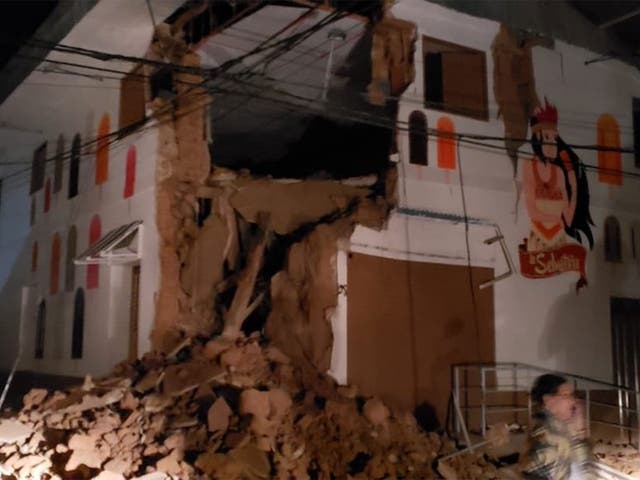 Partially collapsed buildings in the town of Yurimaguas, close to the epicenter of the earthquake