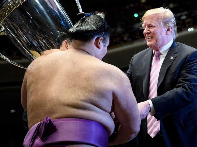Donald Trump presents the President's Cup to Asanoyama as part of state visit