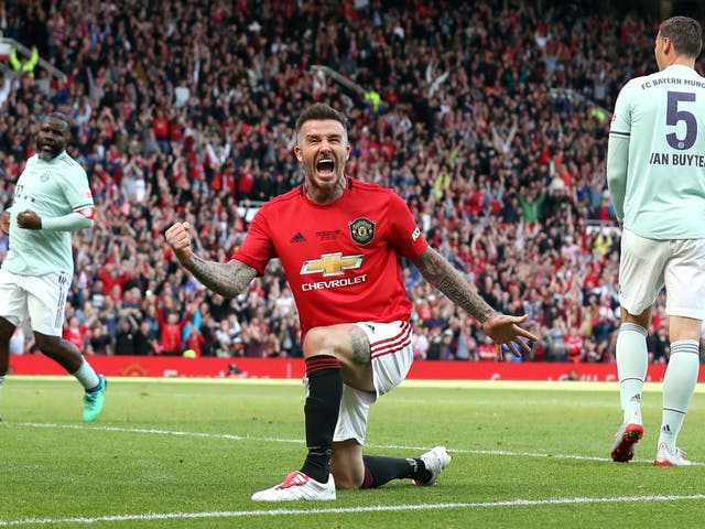 David Beckham celebrates scoring Manchester United's fifth goal