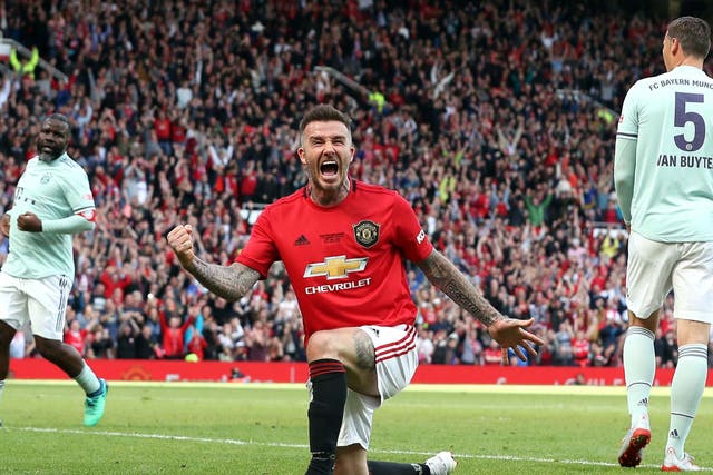 David Beckham celebrates scoring Manchester United's fifth goal