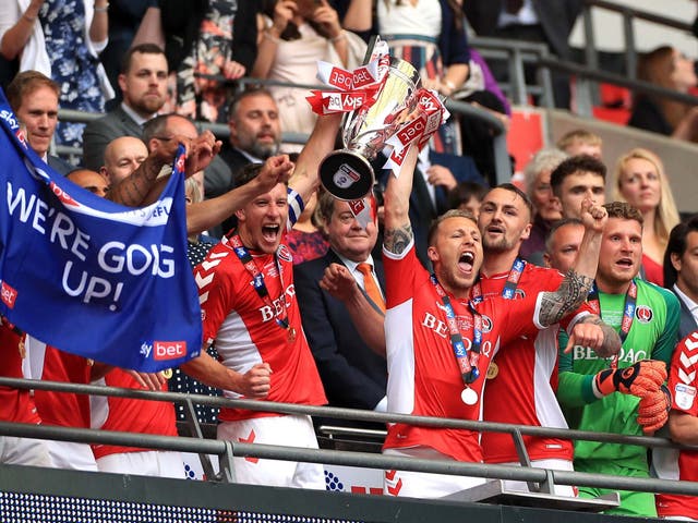 Charlton celebrate winning the League One play-offs against Sunderland to earn promotion to the Championship