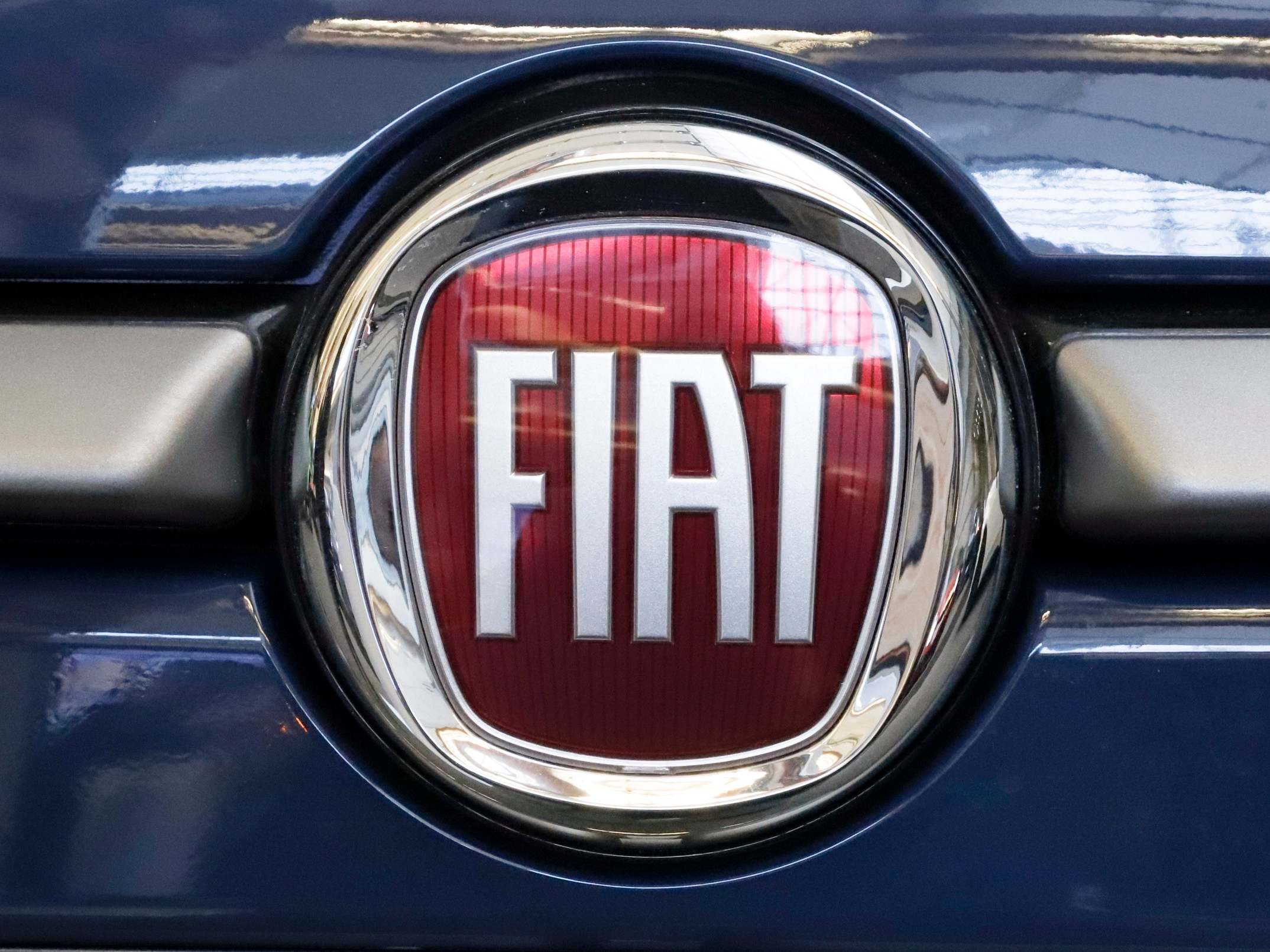 In this Feb. 14, 2019, file photo, this is the Fiat logo is mounted on a 2019 500 L on display at the 2019 Pittsburgh International Auto Show