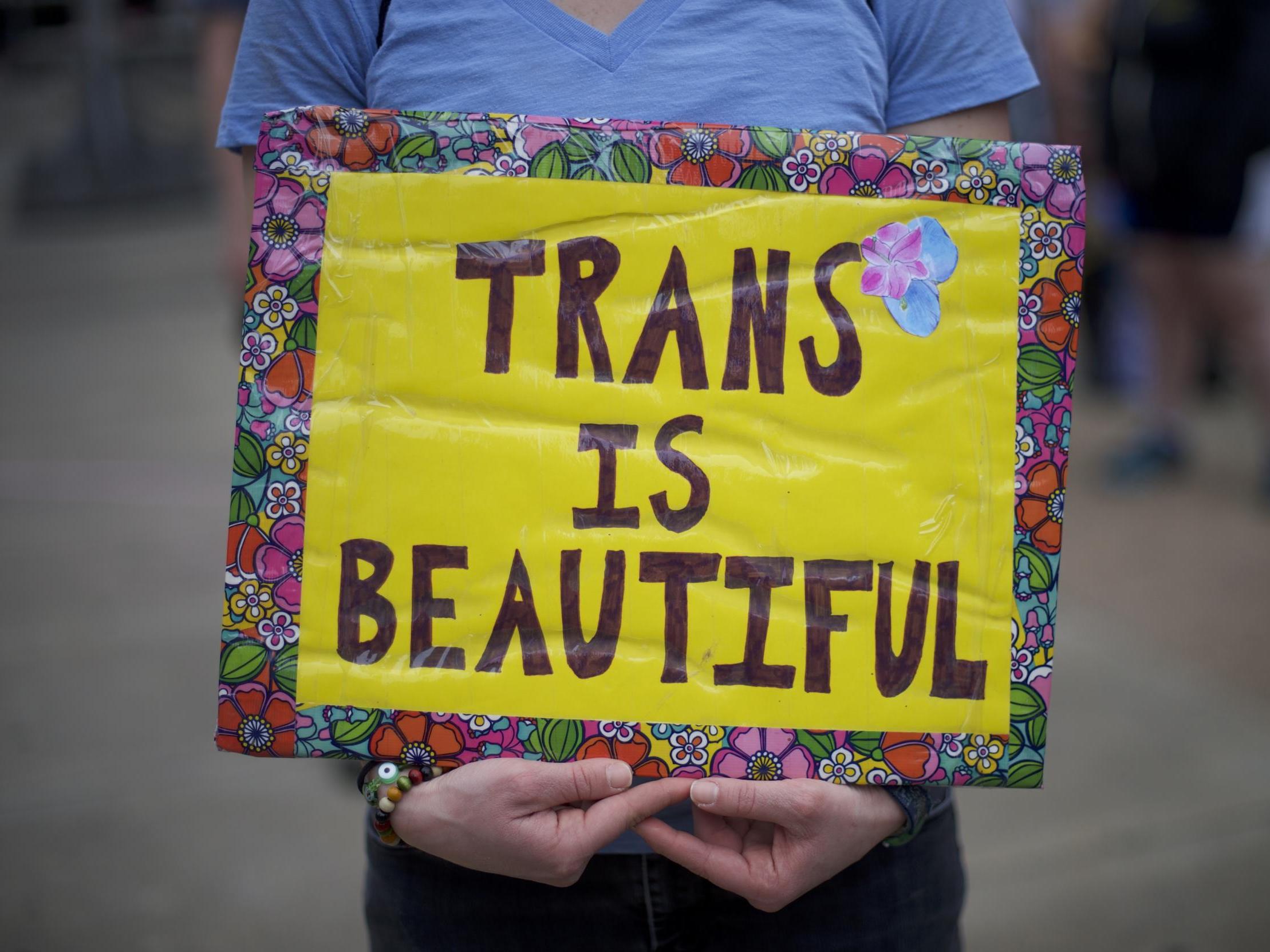 Protestors demonstrate during a rally against the transgender bathroom rights repeal at Thomas Paine Plaza 15 February 2017 in Philadelphia, Pennsylvania