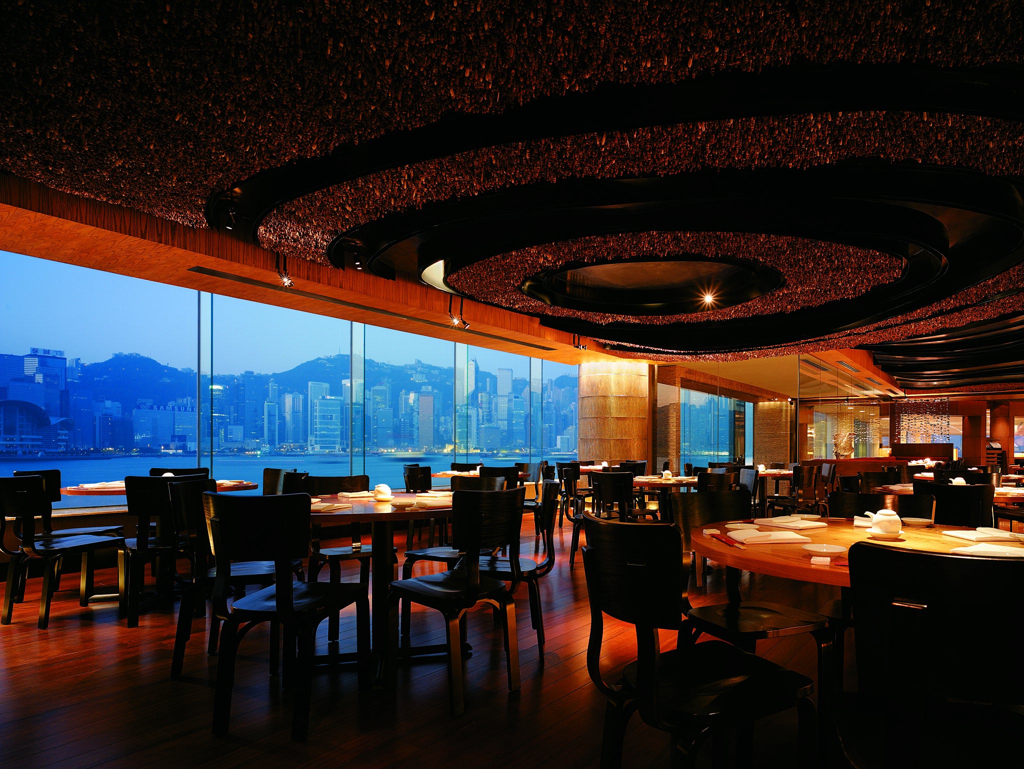 The interior of NOBU restaurant at InterContinental Hong Kong: complete with Victoria Harbour views