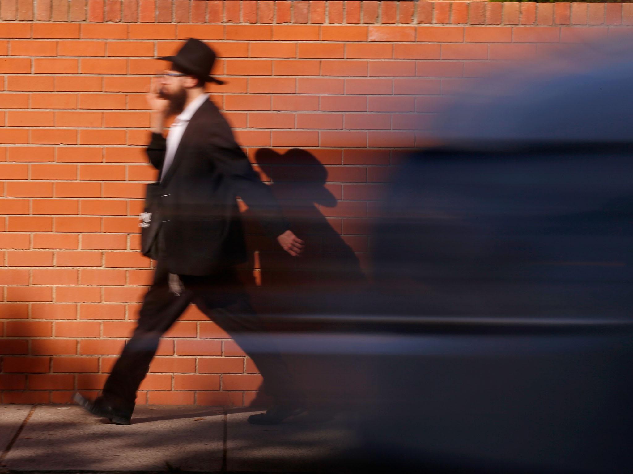 An Orthodox Jewish man walks along Hotham Street in St Kilda East, Melbourne. Approximately 120,000 Jews live in Australia today