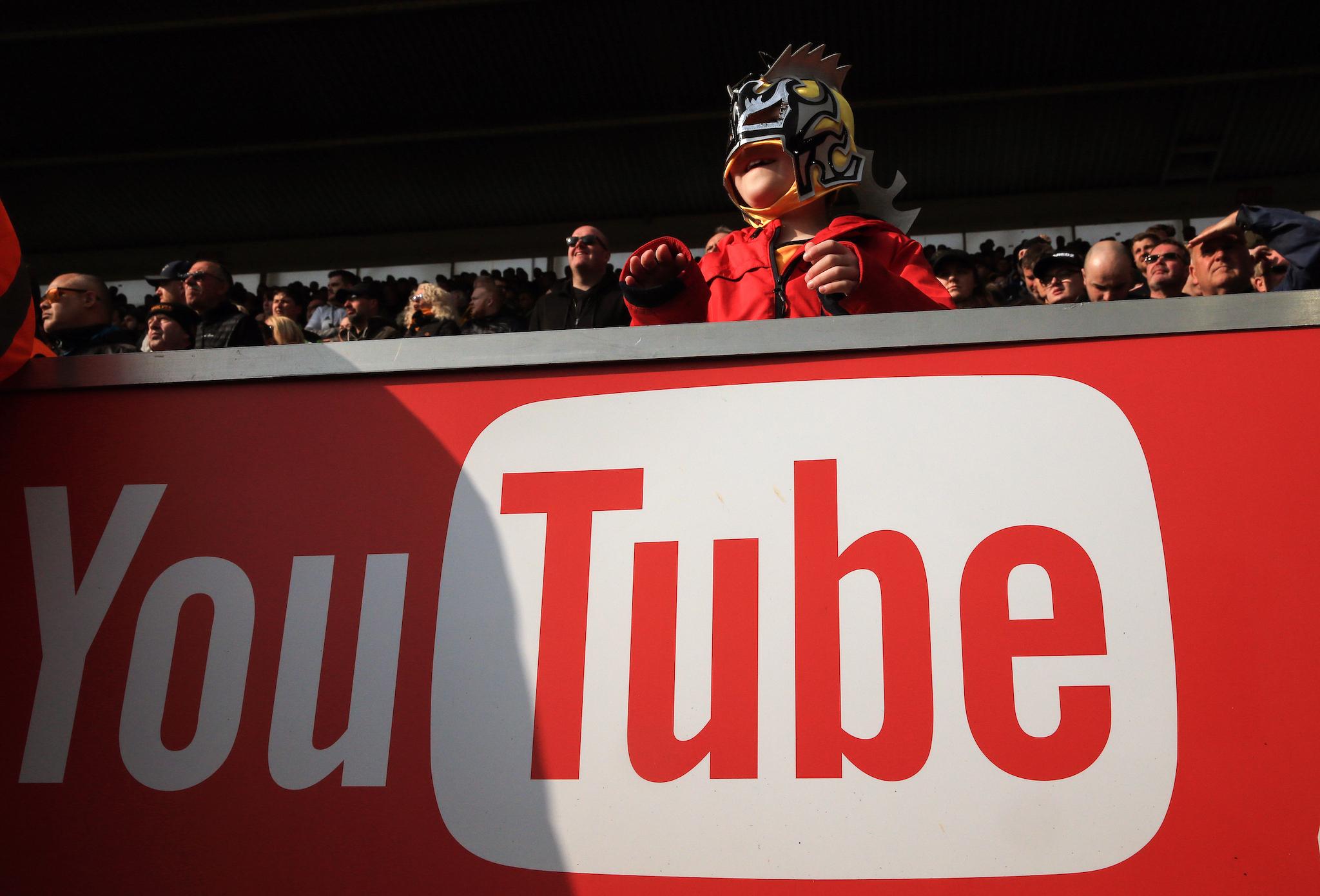 A young Wolves fan wears a Mexican wrestlers mask during the Premier League match between Southampton FC and Wolverhampton Wanderers